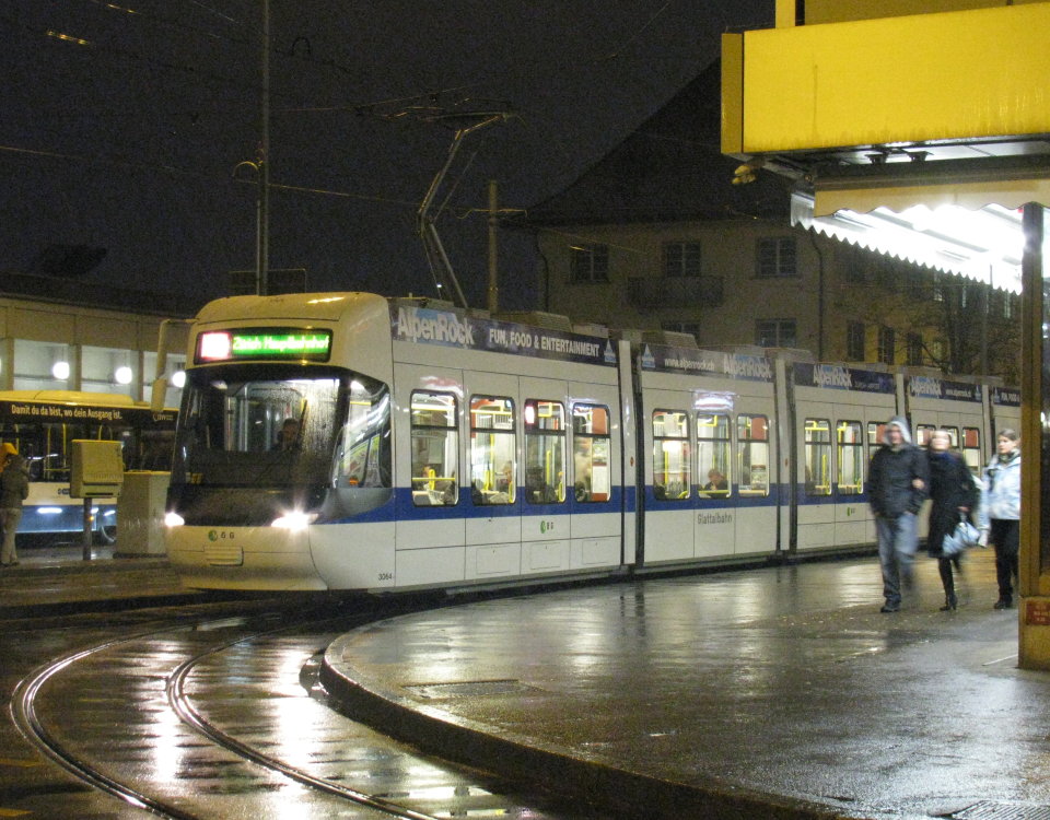 Cobra tram at night in Oerlikon